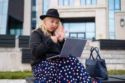 Young woman using mobile phone