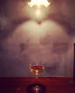 Close-up of wineglass on table