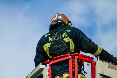 Low angle view of fire hydrant against sky