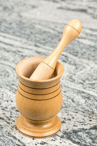 Close-up of wood on sand