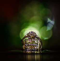 Close-up of a wedding rings on table