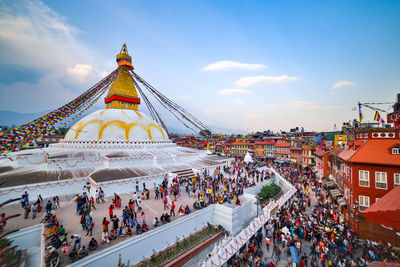 Crowd visiting temple in city