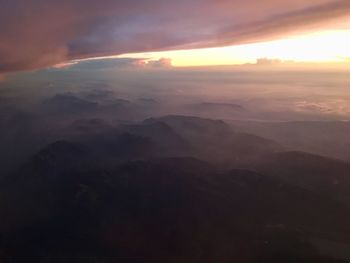 Scenic view of mountains against sky during sunset