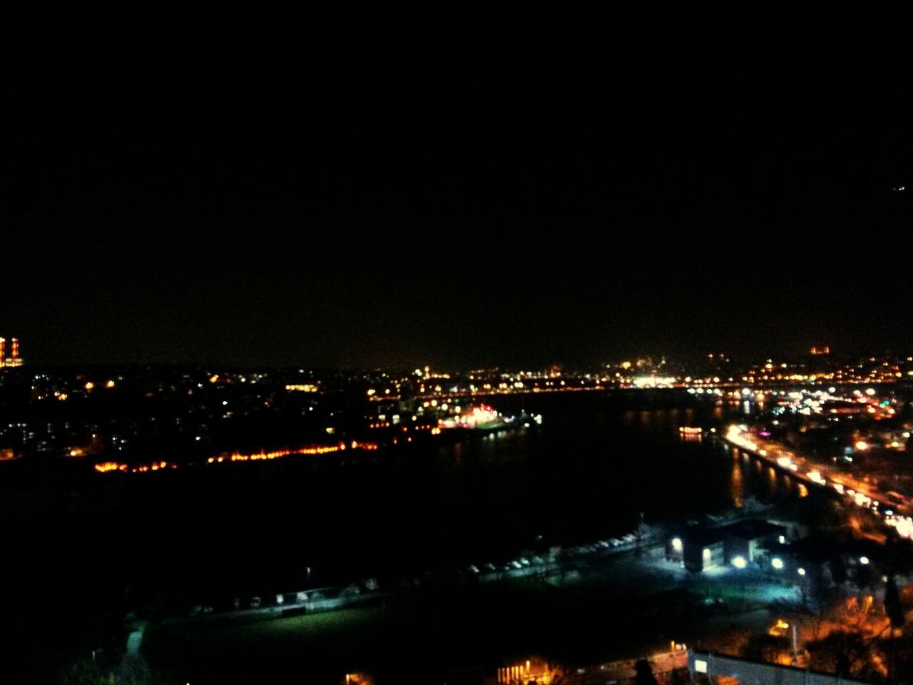 night, illuminated, cityscape, city, building exterior, built structure, architecture, copy space, crowded, high angle view, dark, clear sky, residential district, sky, city life, aerial view, residential building, outdoors, light, no people