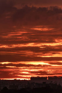 Scenic view of dramatic sky during sunset