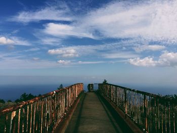 Pier on sea against sky