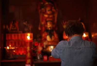 People praying at vihara dharma ramsi, bandung during chinese new year 2570.