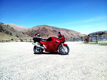 Man riding motorcycle on mountain road