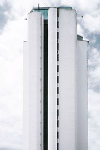 Low angle view of smoke stack against sky