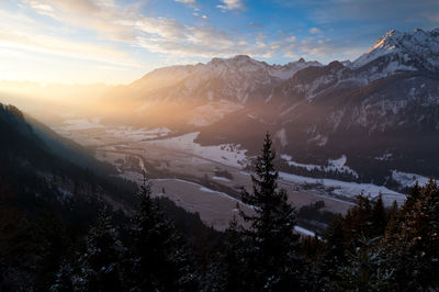 Scenic view of mountains against sky during winter