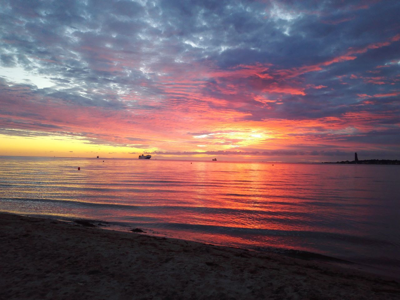 sea, sunset, water, sky, horizon over water, beach, scenics, tranquil scene, beauty in nature, tranquility, cloud - sky, shore, idyllic, nature, orange color, cloudy, cloud, dramatic sky, outdoors, sun, remote, non-urban scene, calm, no people, weather, ocean, seascape, majestic