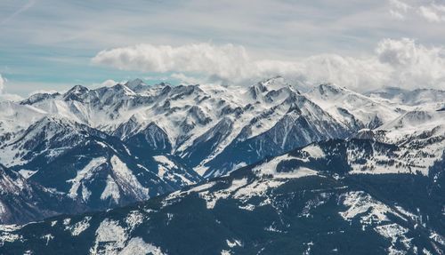 Scenic view of snowcapped mountains against sky