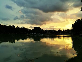 Scenic view of lake against sky during sunset