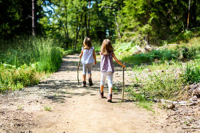 Sisters in forest