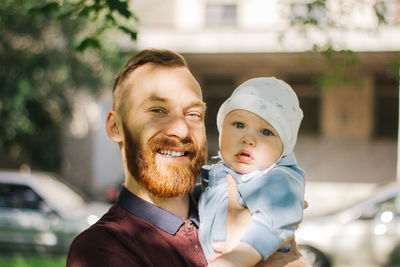 Portrait of father with son