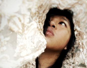 Low angle view of woman with scarf