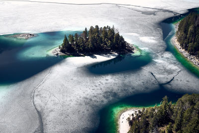 Scenic view of snow covered land