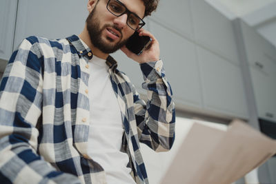Young man using mobile phone
