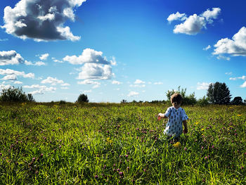 Scenic view of field against sky