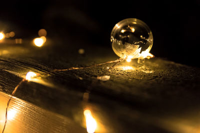 Close-up of illuminated light bulb