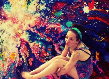 Portrait of a beautiful young woman in autumn