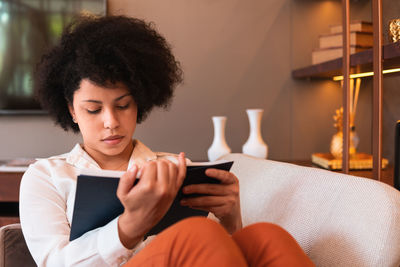 Young woman using mobile phone