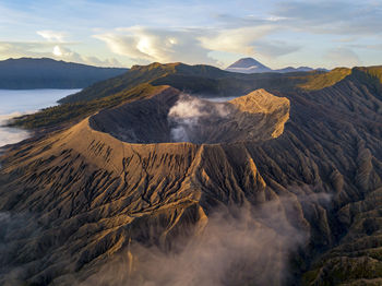 Smoke emitting from volcanic mountain at bromo tengger semeru national park, east java, indonesia