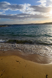 Scenic view of sea against sky during sunset