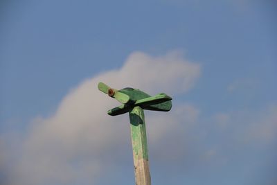Low angle view of plant against blue sky
