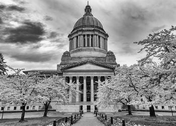 Built structure against cloudy sky