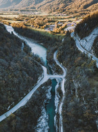 High angle view of river amidst mountains