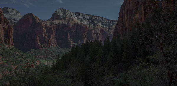 Scenic view of rocky mountains against sky