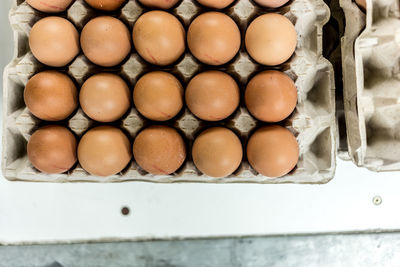Directly above shot of eggs in carton