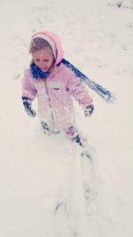 Girl playing in snow