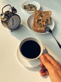 High angle view of coffee cup on table