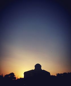 View of built structure at sunset