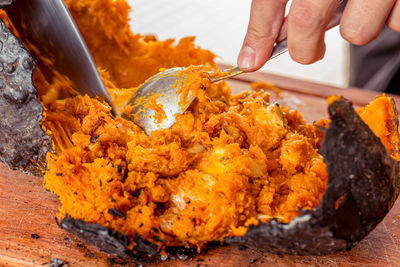 Close-up of person preparing food