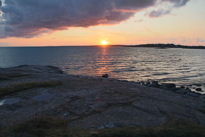 Scenic view of sea against sky during sunset