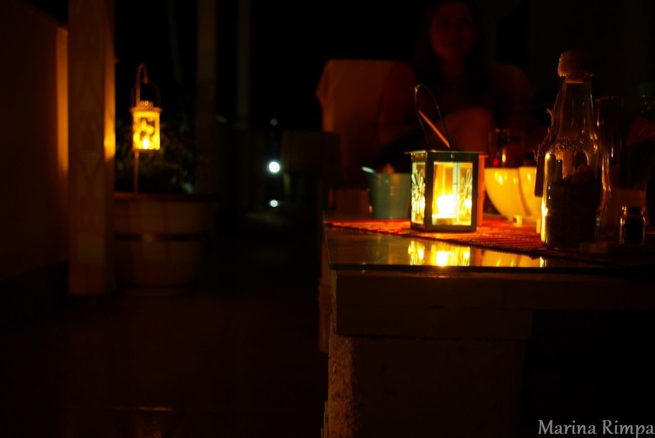 illuminated, night, indoors, candle, lighting equipment, lit, glowing, flame, dark, burning, light - natural phenomenon, lantern, fire - natural phenomenon, electricity, candlelight, religion, close-up, light, focus on foreground, no people