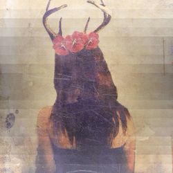 Woman standing on wall