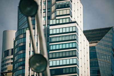 Low angle view of modern buildings against sky