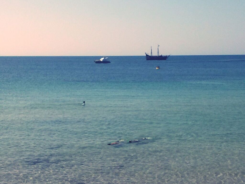 sea, water, nautical vessel, transportation, horizon over water, mode of transport, boat, clear sky, tranquil scene, tranquility, scenics, waterfront, copy space, beauty in nature, nature, sailing, seascape, rippled, idyllic, travel