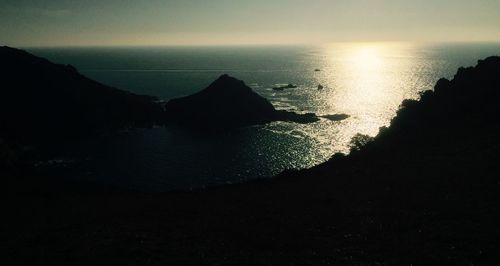 Scenic view of sea against sky at sunset