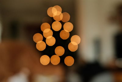 Defocused image of illuminated christmas tree