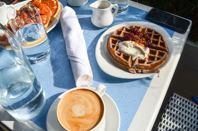 High angle view of coffee on table