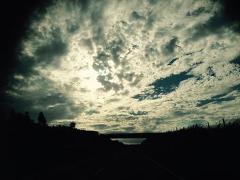 Scenic view of landscape against cloudy sky