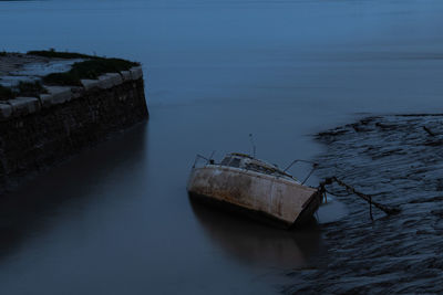 High angle view of abandoned boat in sea