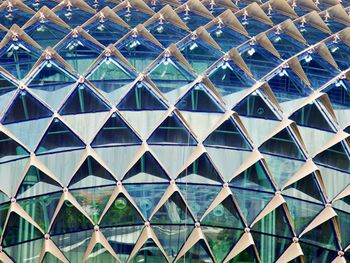 Full frame shot of modern glass building in city