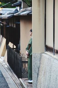 Man in front of built structure