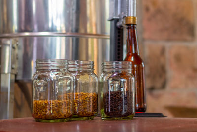 Close-up of drink in glass jar on table